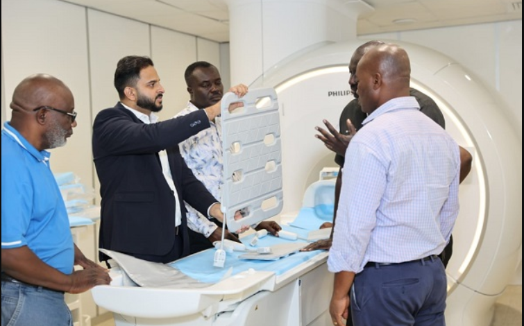 Reps from Philips HealthTech at installation of the MRI machines at 37 Military Hospital