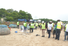 Mr Anyetei (second from right) with Ms Sowah (fourth from right) and other dignitaries inspecting progress of the clean-up exercise at the Polo Beach Photo Victor A. Buxton