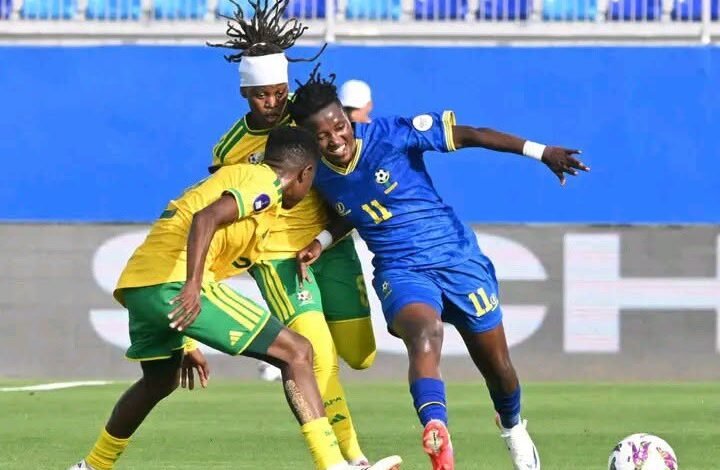 Ester Maseke of Tanzania challenging Thembi Kgatlana (left) of South Africa during the game