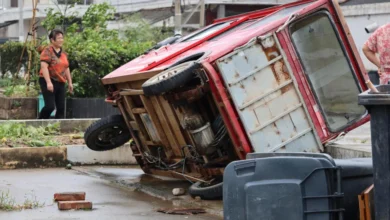 A vehicle knocked over by winds in China's eastern Zhejiang province