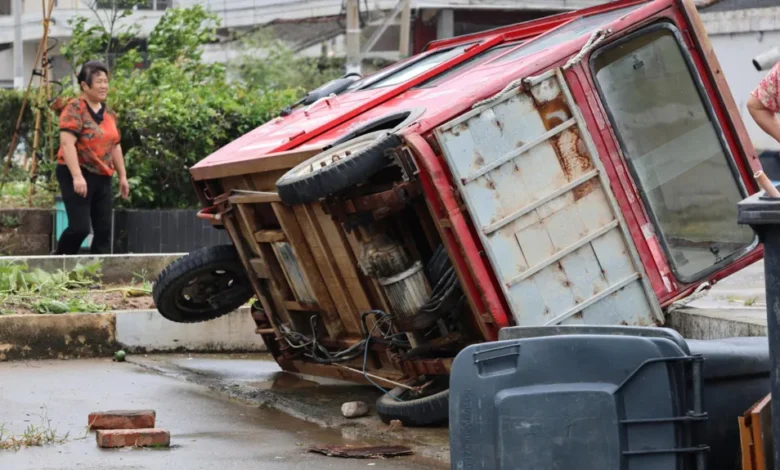 A vehicle knocked over by winds in China's eastern Zhejiang province