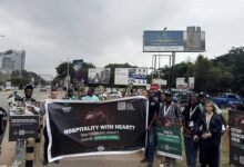 Members of AWL displaying placards during the demonstration