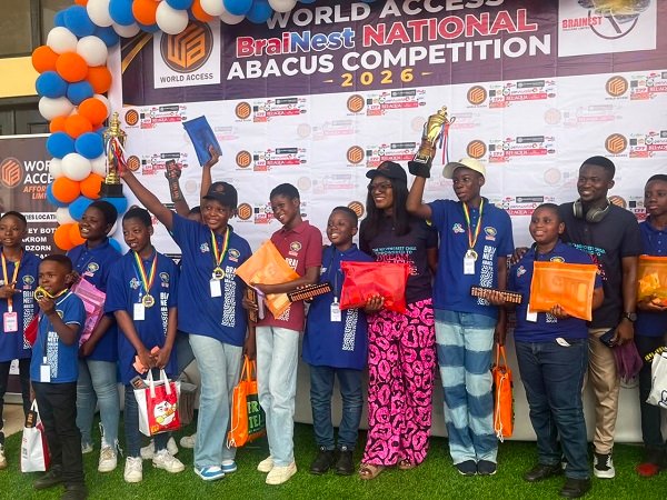 Some of the students displaying their awards and gift after the competition