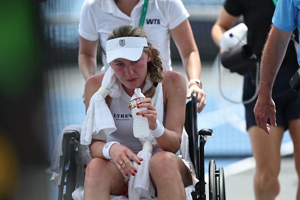 Alexandrova was helped off court in a wheelchair after collapsing