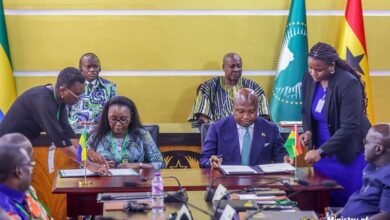 Mr Okudzeto Ablakwa (right) and Marie-Edith Tassyla-Ye-Doumbenen signing the agreement
