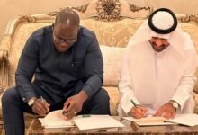 Dr. Dogbey, (left) and the Saudi Arabian partner signing the agreement