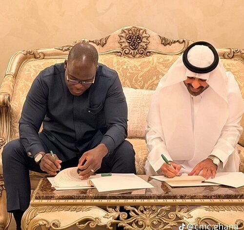 Dr. Dogbey, (left) and the Saudi Arabian partner signing the agreement