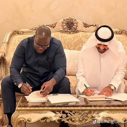 Dr. Dogbey, (left) and the Saudi Arabian partner signing the agreement
