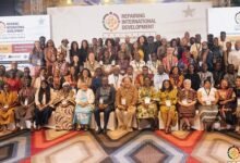 Mr Camara (seated fourth from left) with other dignitaries during the conference