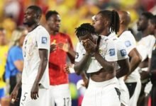 Dejected Black Stars players after the game against Colombia