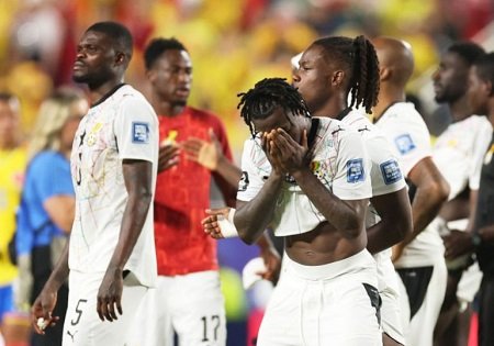 Dejected Black Stars players after the game against Colombia