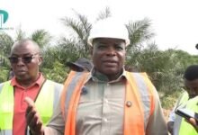 Mr Agbodza (right) speaking after inspecting one of the roads