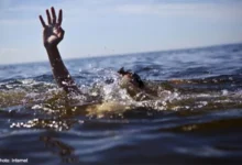 A scene of a drowning person at the beach