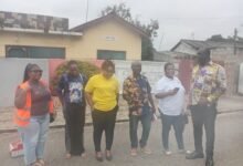 ECG officials with Nii Aryeetey Tagoe