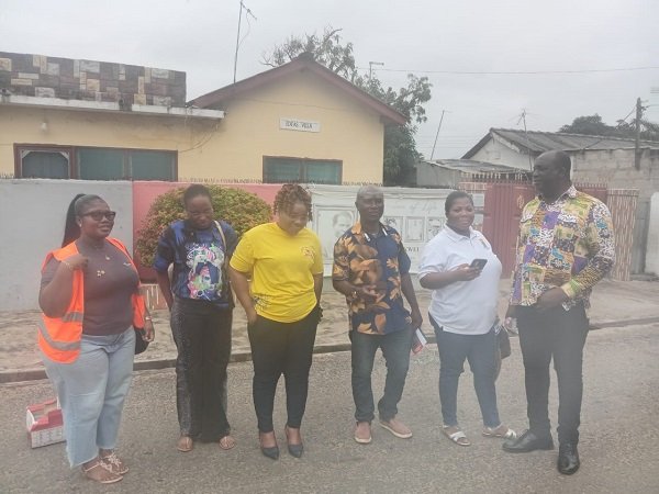 ECG officials with Nii Aryeetey Tagoe