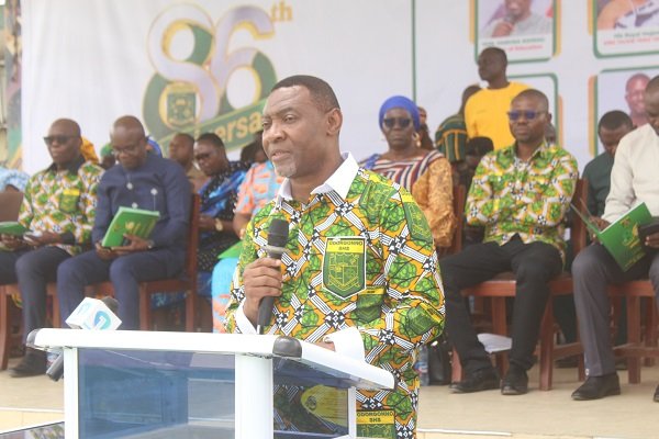 Rev. Lawrence Tetteh (inset) addressing students at the speech and prize-giving day. Photo Ebo Gorman