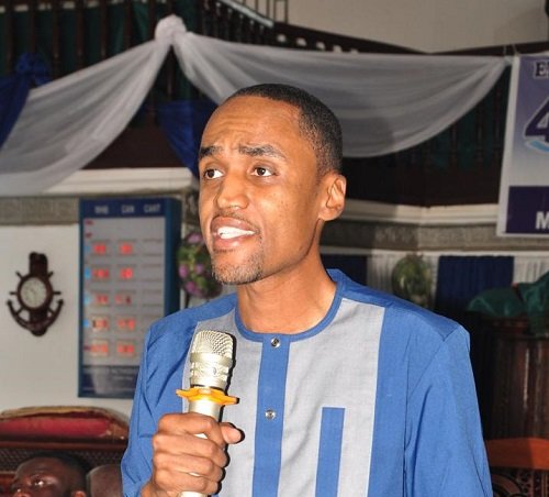 Mr Sam - Woode (inset) speaking at the programme