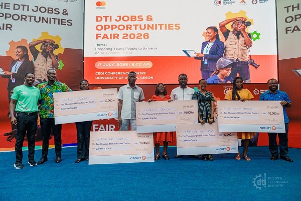 Award winners displaying their dummy cheques at the fair. Photo. Ebo Gorman