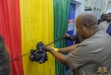 President John Dramani Mahama cutting the tape to inaugurate the Cardiac Catheterisation Laboratory at Korle Bu Teaching Hospital