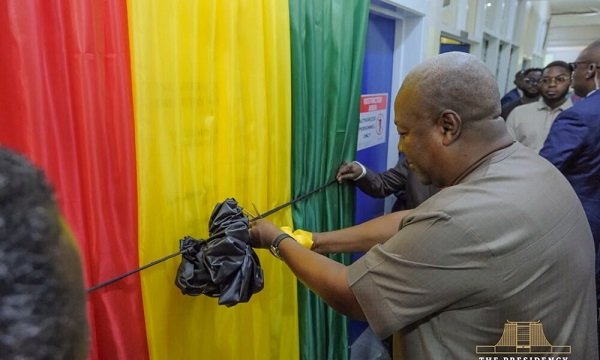 President John Dramani Mahama cutting the tape to inaugurate the Cardiac Catheterisation Laboratory at Korle Bu Teaching Hospital