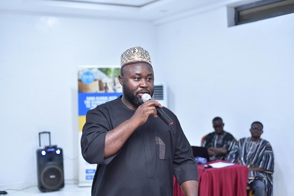 Mr Be-Awuribe (inset) addressing participants at the programme.