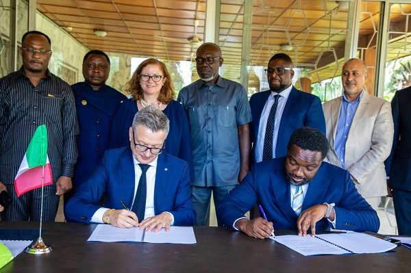 Mr Dreolini (left) and Mr Ankrah signing the MoU
