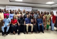 Mr Madjie (seated third from left) with other participants after the conference