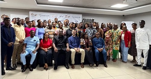Mr Madjie (seated third from left) with other participants after the conference