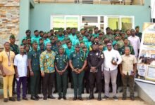 Mr Asanoah-Boakye (fourth from right) with other senior security officers and participants at the programme