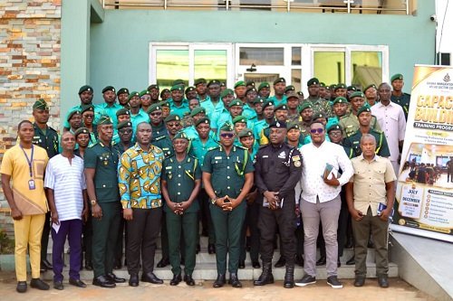 Mr Asanoah-Boakye (fourth from right) with other senior security officers and participants at the programme