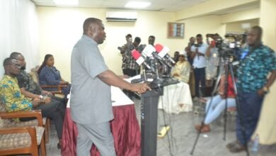 Mr Dwumfour (standing) addressing the media. Photo Victor A. Buxton