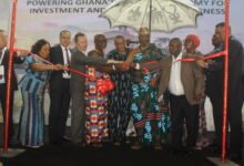 Ga Mantse, King Tackie Teiko Tsuru II (fifth from right), Mr Goosie Tanoh (sixth from left) and other invited guests cutting the tape to open the exhibition. Photo. Ebo Gorman