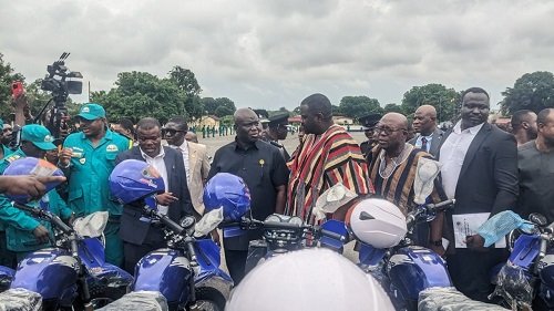 Mr Opoku (middle) and other officals from the ministry inspecting some of the motorbikes for the Brigadiers