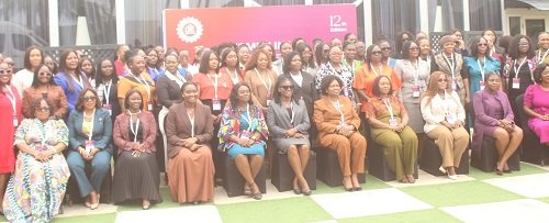 Mrs. Victoria Hajar ( seated fifth from right) and Ms Wiredu-Akpabli (sixth from left) with some women from HR after the opening ceremony. Photo Ebo Gorman