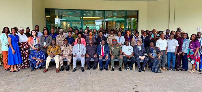 Mr Okletey Terlabi (seated fourth from left) with Maj. Gen. M. O. Mantey (seated forth from right) and other stakeholders at the programme