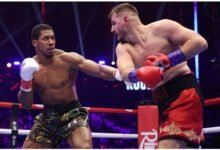 Joshua (left) recovered from two knockdowns to stop Prenga in the second round