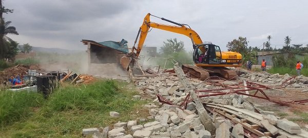 One of the structures being demolished
