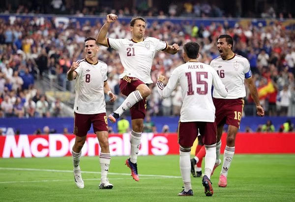 Mikel Oyarzabal (21) celebrates the opening goal with team mates