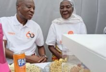 Mr Sulley in a tete-a-tete with Ms Dagomba during the celebration
