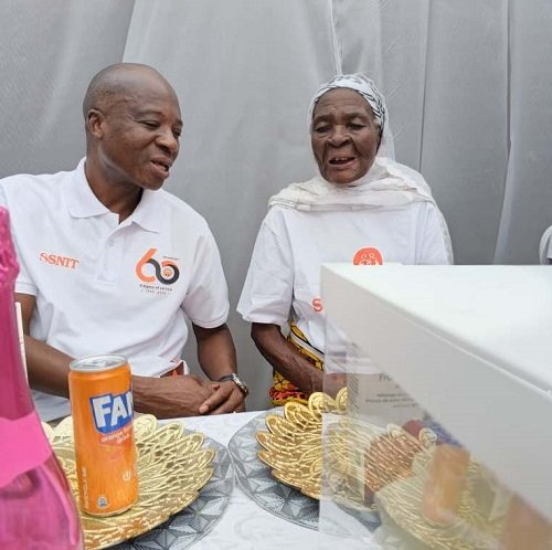 Mr Sulley in a tete-a-tete with Ms Dagomba during the celebration