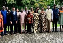 Mr Tweneboah Kodua (front row, third from left) with Mr Moore (front row, fifth from left) and other stakeholders after the meeting