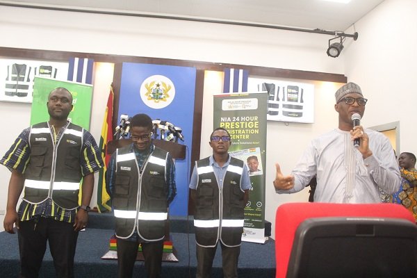 Alhaji Muntaka Mohammed-Mubarak, (right) outdooring the NIA biometric verification implementation taskforce at the press briefing. Photo Ebo Gorman