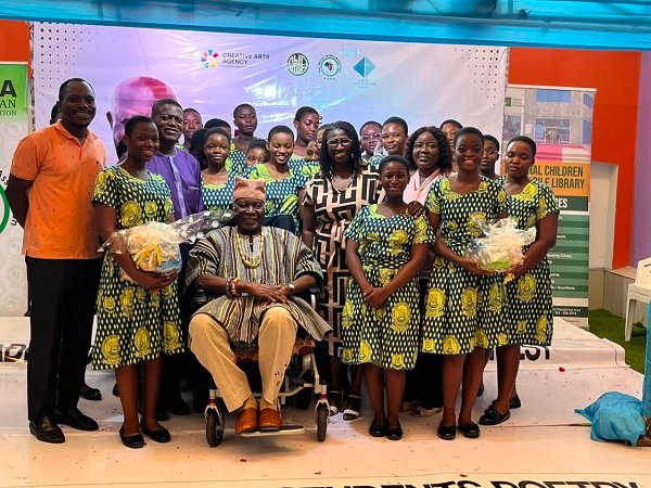 Dr. Okediran (standing left), and Professor Ladé Wosornu (seated) with the students after the programme
