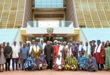 President Mahama (middle) with Mr Julius Debrah (eighth from left) and the delegation at Jubilee House