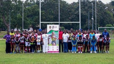 RLFG executives, teachers and players of all four teams posing with the trophies