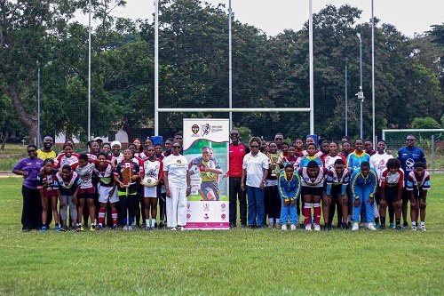 RLFG executives, teachers and players of all four teams posing with the trophies