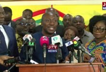 Mr Afenyo-Markin (middle) addressing the press.