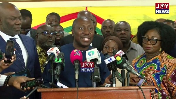 Mr Afenyo-Markin (middle) addressing the press.
