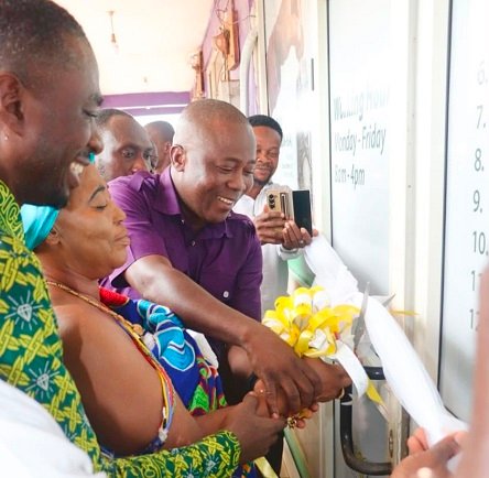 -Nana Afia Serwaa ‌and Mr Solomon Twum Barima jointly cutting the tape to open the SIC Life office