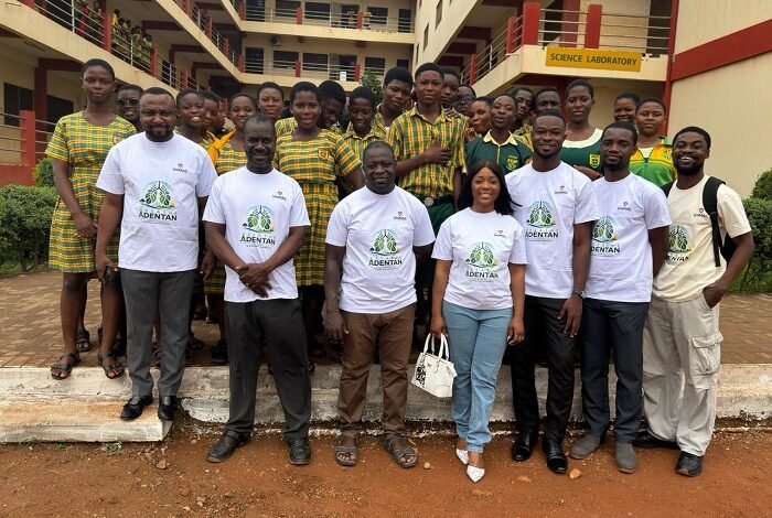 The team with students in the school after the programme